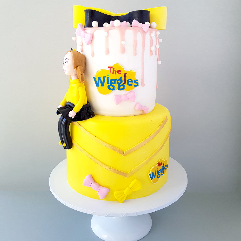 The Wiggles in Yellow and Black Cake 