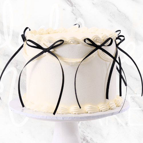 White Vintage Ribbon Cake